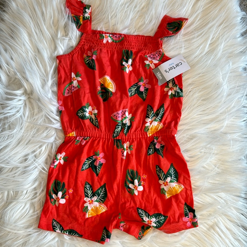 Reddish orange romper with ruffle sleeves